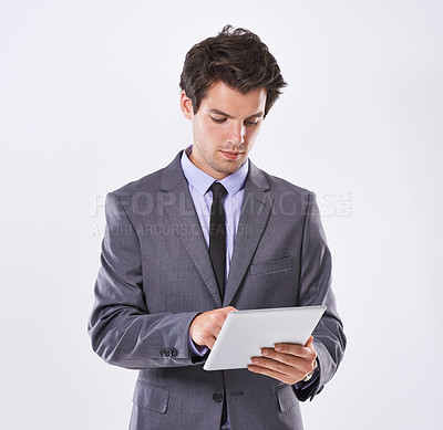 Buy stock photo Businessman, tablet and studio for email networking, communication online and white background. Male person, calendar app and planning for schedule reminder, broker and website for finance report