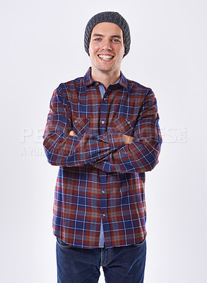 Buy stock photo Portrait, man and fashion with confident, happy and smiling in white background for comfort wear. Male person, style and beanie with arms crossed, satisfied and overshirt for casual outfit or clothes