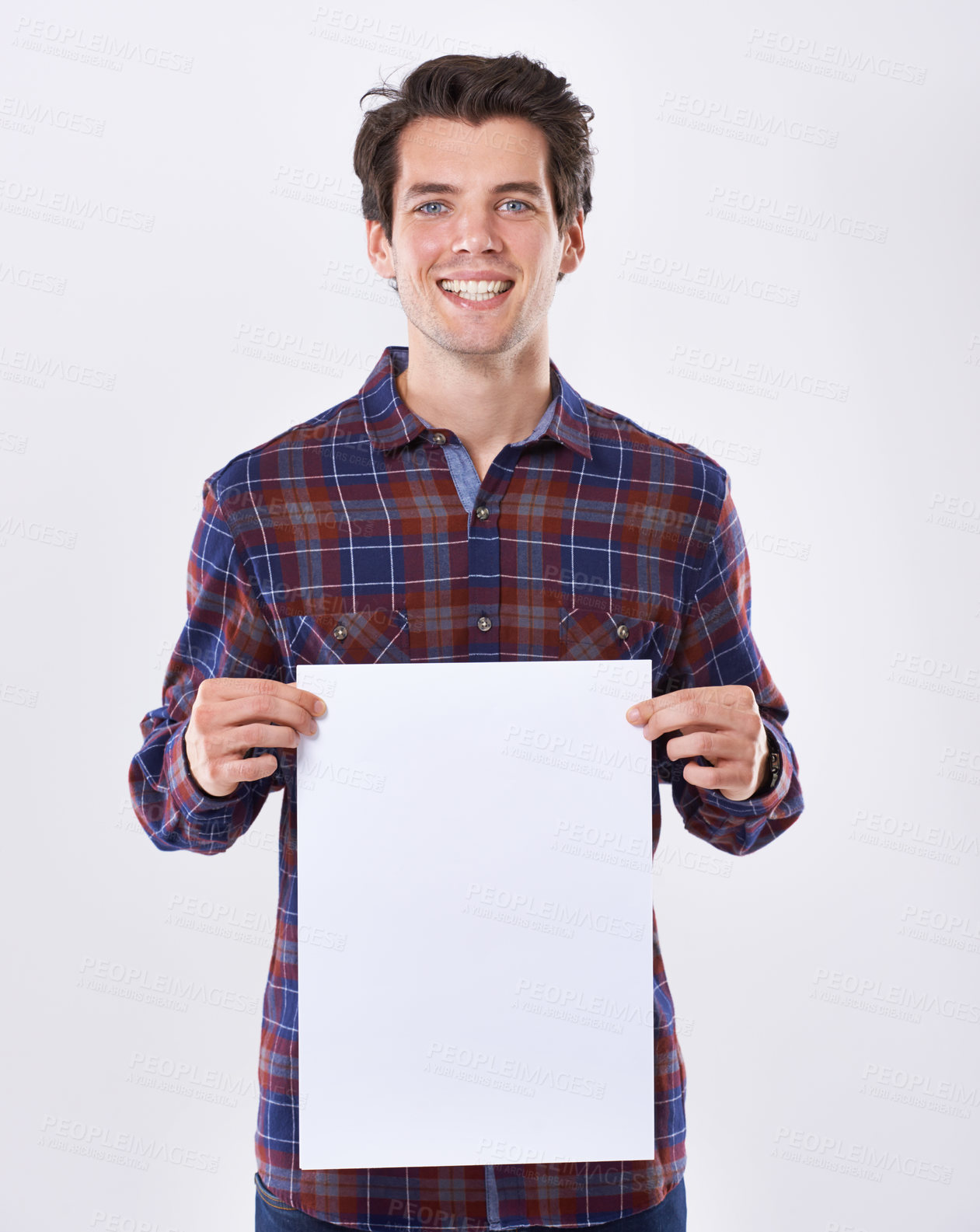 Buy stock photo Happy man, portrait and blank poster in studio, paper announcement and info on white background. Male person, empty placard and commercial board for news, mockup space and offer promotion display