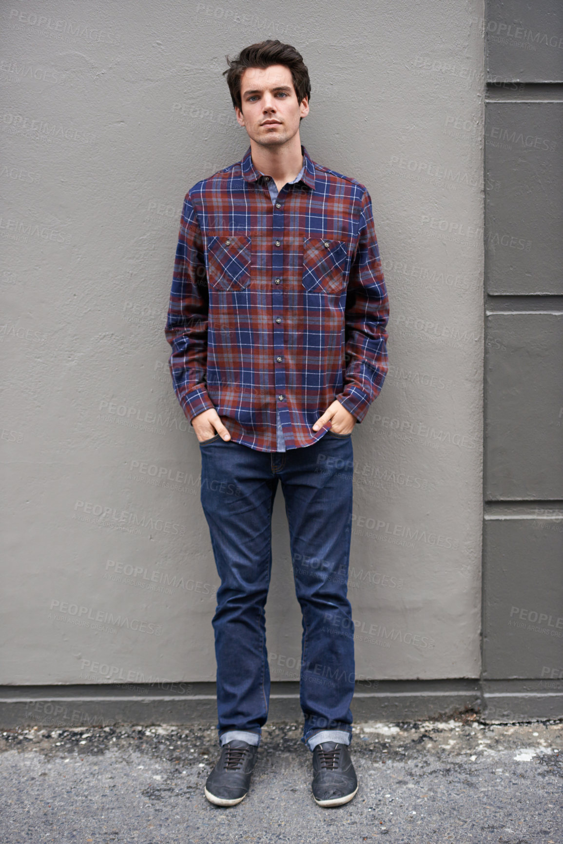 Buy stock photo Wall, fashion and man in city, portrait and confidence with gen z, calm and buildings. Face, full body and person with urban town, pride and casual outfit with shirt, outdoor and stylish clothes