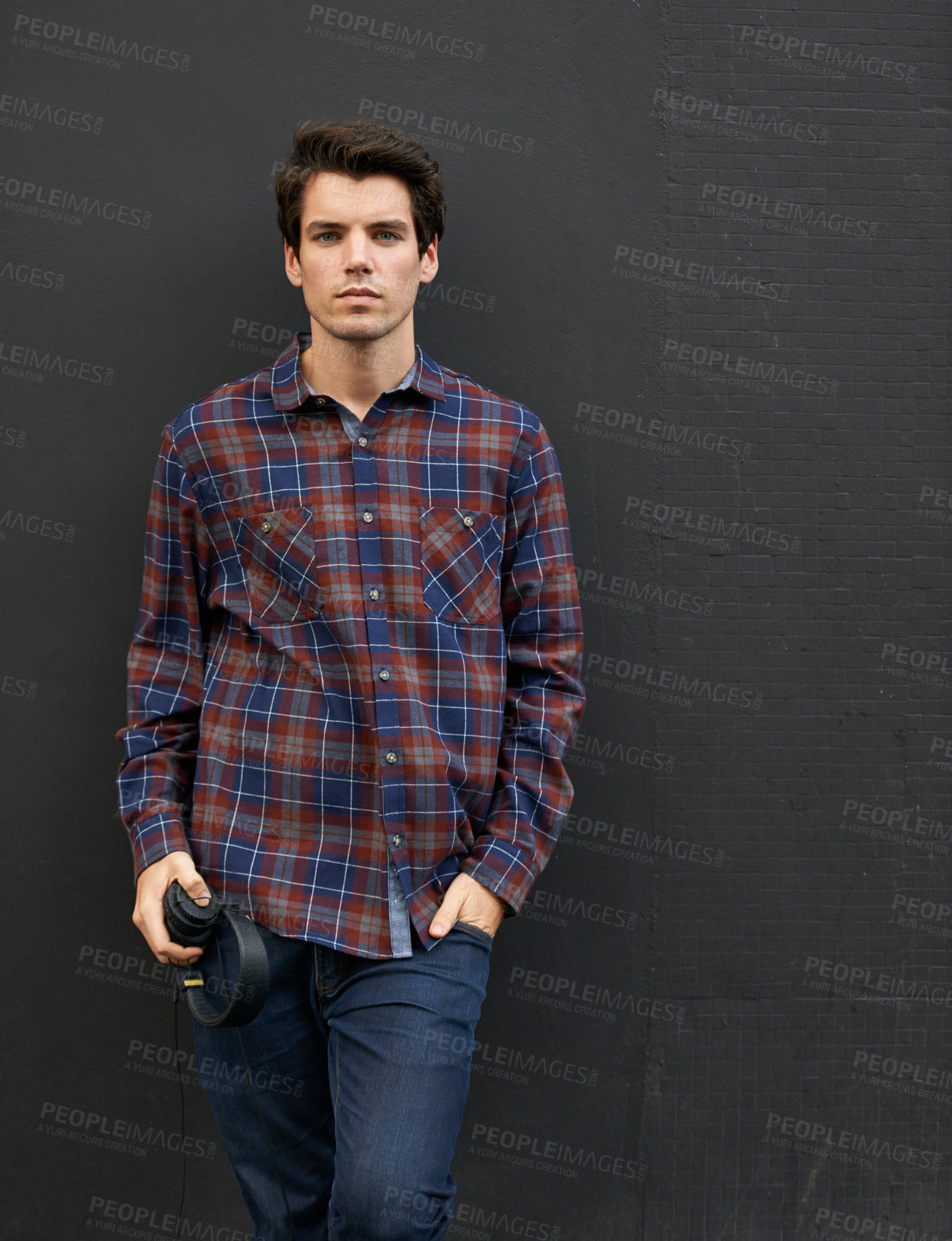 Buy stock photo Portrait, fashion and man with headphones, black wall and confidence with mockup space. Face, person and guy with headset, trendy clothes and gen z with stylish outfit, edgy and sound with audio