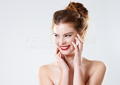 Buy stock photo Woman, touch and smile in studio for makeup, self care and beauty cosmetics with red lipstick. Female person, face and happy on white background for foundation, aesthetic or facial transformation
