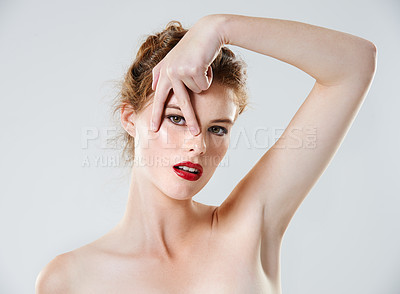 Buy stock photo Beauty, pose and woman with lipstick, portrait and makeup for flirt, mockup and skin with cosmetics isolated on white studio background. Skincare, peace and red with spa treatment and cosmetic care