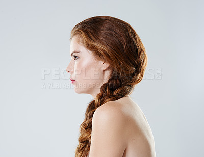 Buy stock photo Woman, healthy haircare and braid in studio, profile and hairstyle for maintenance on white background. Female person, cosmetic texture and plait for scalp treatment, growth and natural grooming