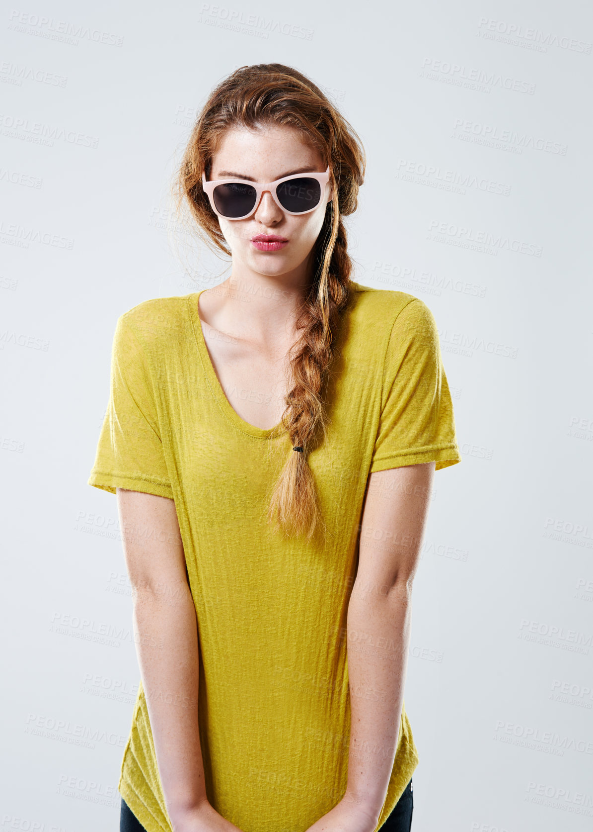 Buy stock photo Studio, woman and pout with sunglasses for fashion, casual outfit and edgy with chic confidence. Female model, portrait and emoji reaction with pride for trendy accessory, cool and white background