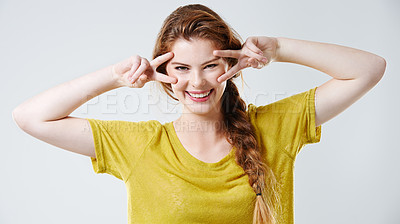 Buy stock photo Studio shot of a casually dressed young woman 