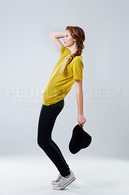 Buy stock photo Profile, dancing and woman with energy, movement and confidence on gray studio background. Side, person and model with creativity, routine and hat with hobby, recreation and training for performance