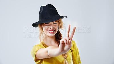 Buy stock photo Peace sign, fashion and portrait of woman in studio with confidence, positive attitude and smile. Emoji, happy and isolated person with hand gesture in trendy clothes and style on white background