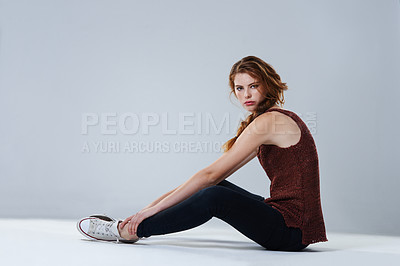 Buy stock photo Portrait of a beautiful young woman wearing casual clothing posing in studio