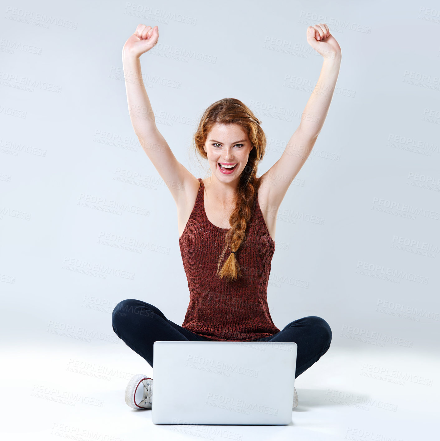 Buy stock photo Happy girl, laptop and celebration in studio portrait, student achievement and application acceptance. Person, university notification and prize for college investment, fist pump and white background