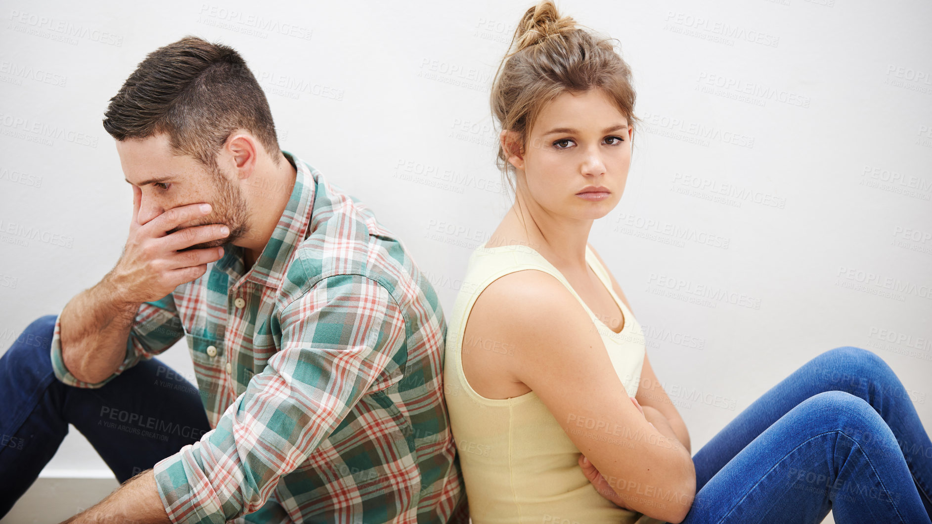 Buy stock photo Couple, stress and conflict in home with backs, fighting and toxic relationship with anxiety. Man overthinking, woman portrait and sitting on floor with depression, frustrated or argue in living room