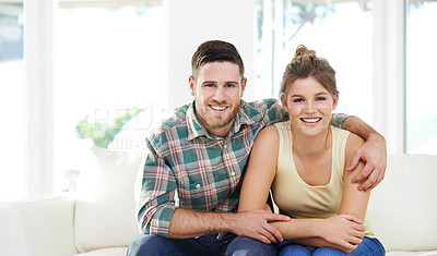 Buy stock photo Portrait, support and happy couple hug in home for love connection and trust partner for relationship in USA. Face, man and woman embrace for bonding together, commitment or relax on living room sofa