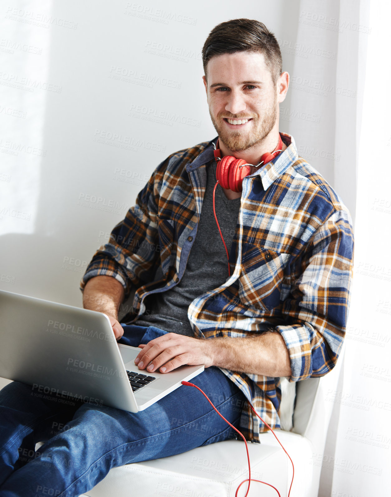 Buy stock photo Man, portrait and headphones for studying on laptop, university student and e learning in home. Male person, chair and online for research on assignment or project, education and website to register