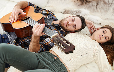 Buy stock photo Couple, home and playing guitar in portrait for love, together and relationship with joy or support. Woman, man and music instrument for bonding, relax and fun in lounge for session, peace and memory