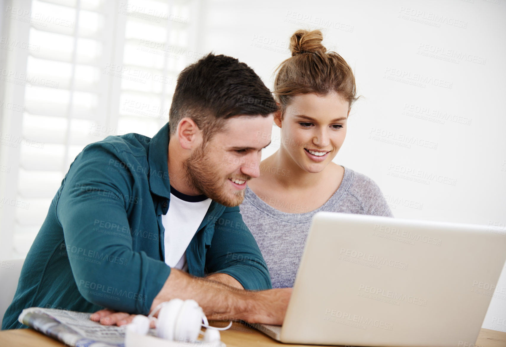 Buy stock photo Headphones, happy or couple on laptop for music choice, reading online article or streaming website. Smile, audio option or people typing on technology for research, subscription or decision in home