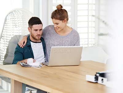 Buy stock photo Couple, home and smile with laptop on website or internet for house planning and furniture options. People, relationship and happy or satisfied on browsing with results for online shopping on table