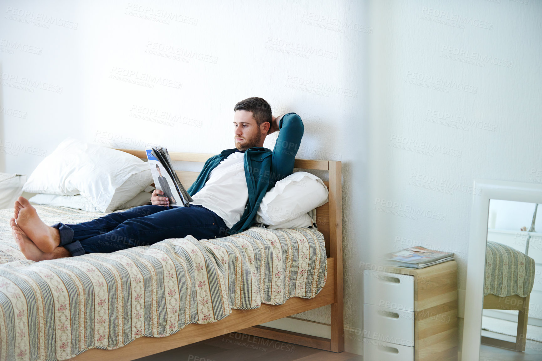 Buy stock photo Man, relax and newspaper in bedroom for reading, business update and social knowledge in bed. Person, chill and article in press for corporate news, stock market information and job search in home
