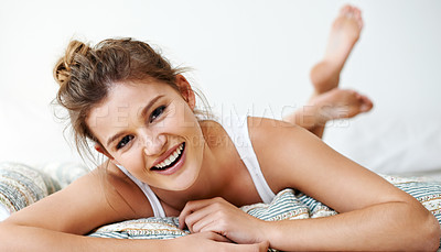 Buy stock photo Woman, awake and morning portrait in bed, happy and lazy weekend in apartment for peace. Female person, comfortable and relax on blanket in bedroom of home, Canada and resting for healthy wellbeing