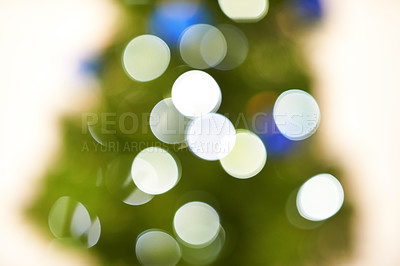 Buy stock photo Defocused abstract shot of a Christmas tree with scattered light