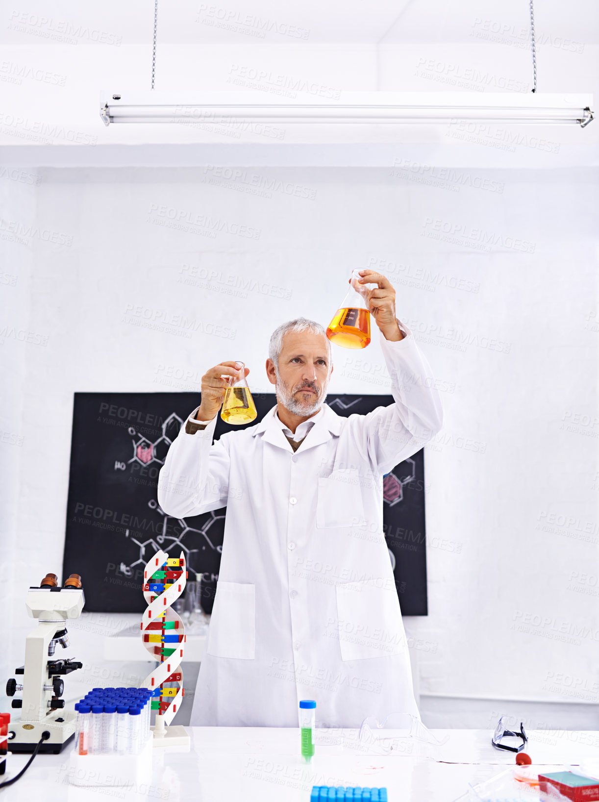 Buy stock photo Experiment, chemistry and mature man in lab, scientist and medical research for drug development and cure. Healthcare, thinking and comparing of results, mpox and  liquid for chemical in clinic