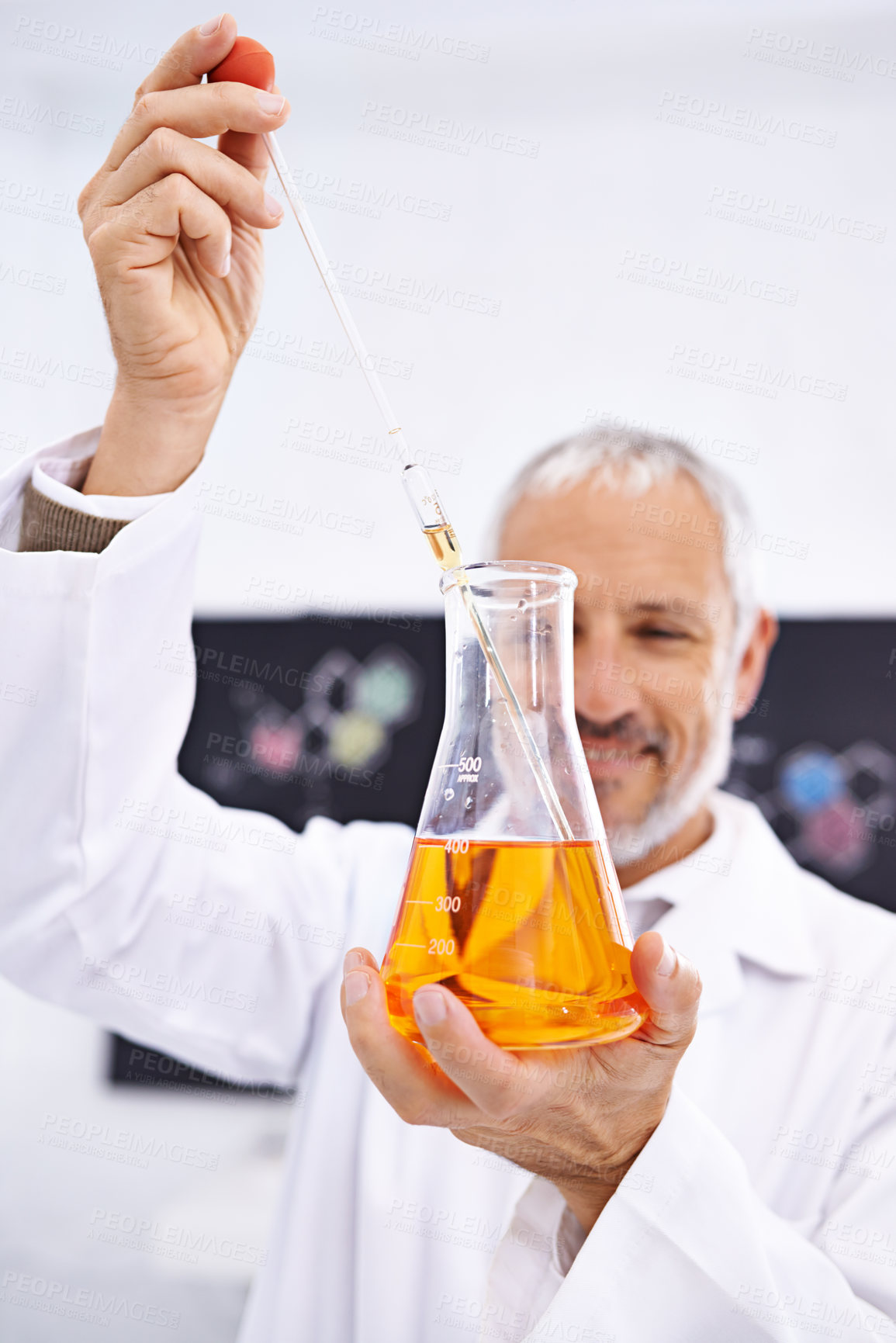 Buy stock photo Happy, chemistry and scientist liquid in lab, mature man and medical research for healthcare. Thinking, chemical and test with dropper, experimental and drug development for mpox, science and clinic