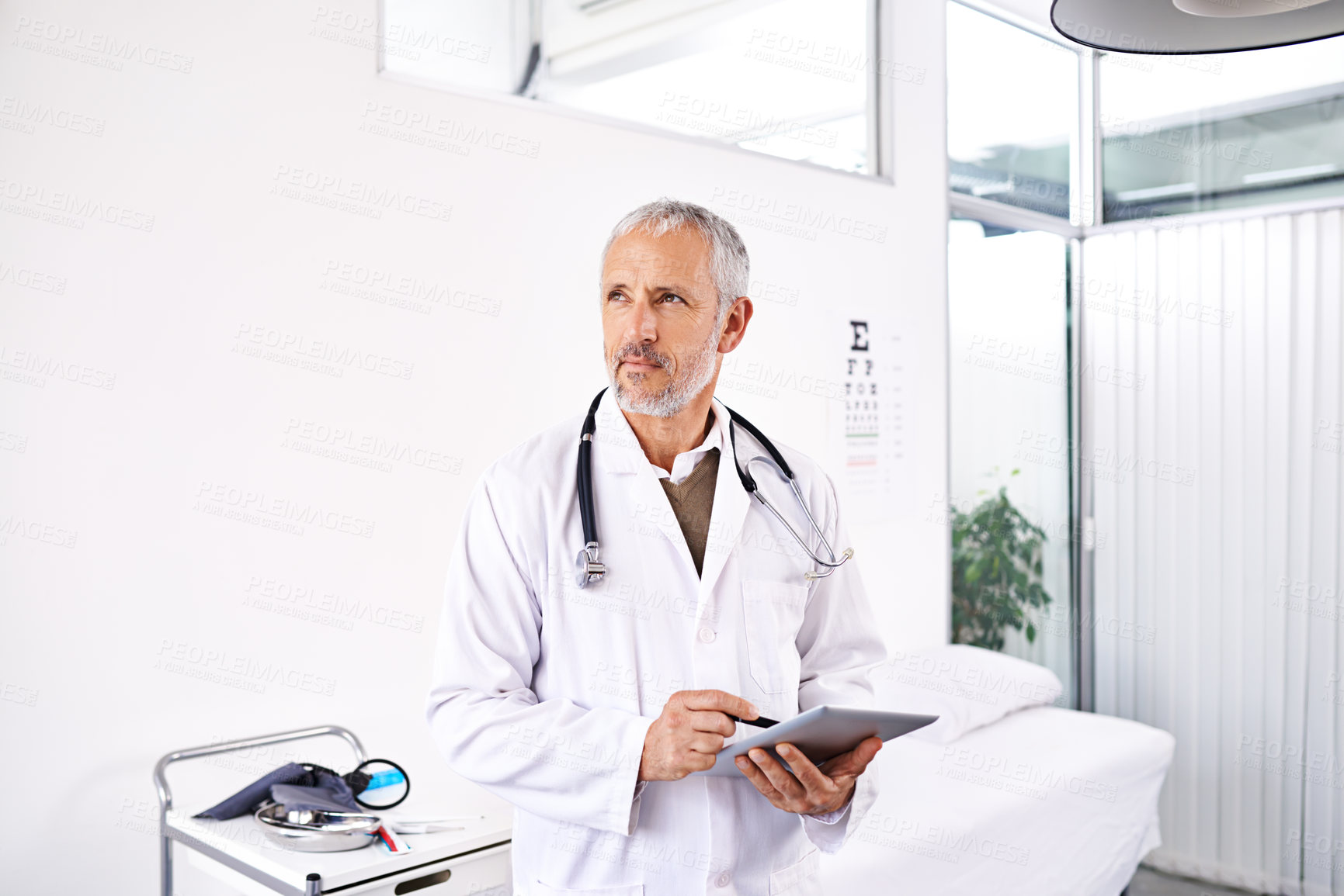 Buy stock photo Tablet, optometry and doctor with man thinking in hospital for telehealth, medical report and diagnosis. Medicine, vision and clinic with mature person for expert, healthcare and eye care specialist