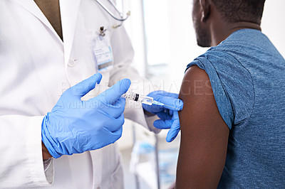 Buy stock photo Closeup shot of a male patient receiving an injection from a doctor