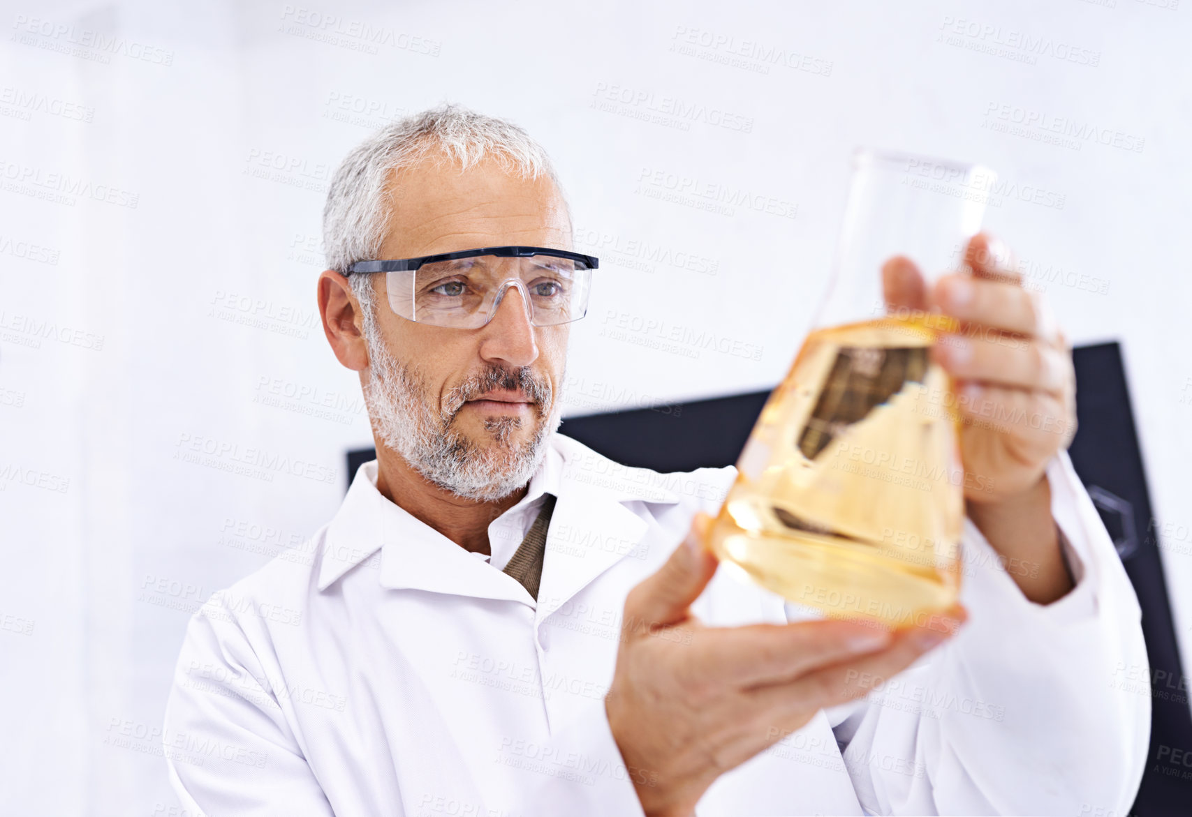 Buy stock photo Mature man, scientist and chemical in glass for scientific experiment, reaction and research. Science, serious and test with medical study or innovation for vaccine, cure and sample for medicine