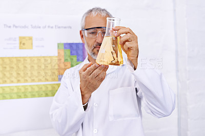 Buy stock photo Mature man, scientist and chemical in beaker for scientific experiment, reaction and research. Science, serious and test with medical study or innovation for vaccine, cure and sample for medicine