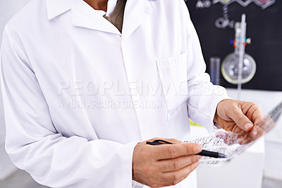 Buy stock photo Person, chemist and writing with hands for dna test, exam or chemical experiment at laboratory. Closeup, scientist or researcher taking notes for trial and error on chemistry, biology or science
