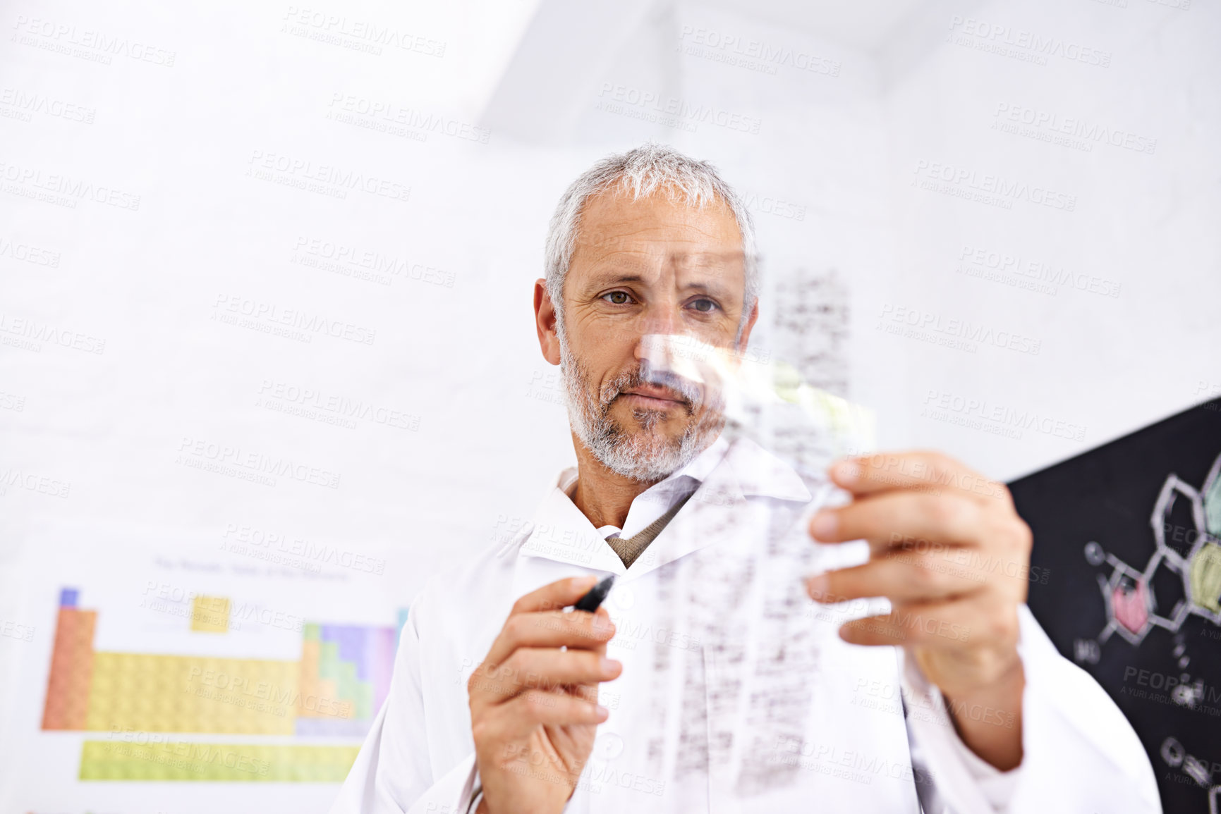Buy stock photo Man, scientist and dna results in lab with medical analysis, review blood test and experiment information. Researcher, reading and genetic markers for science investigation, study and vaccine report