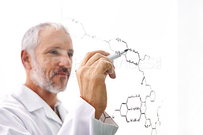 Buy stock photo Shot of a mature male scientist drawing molecular structures on a glass surface