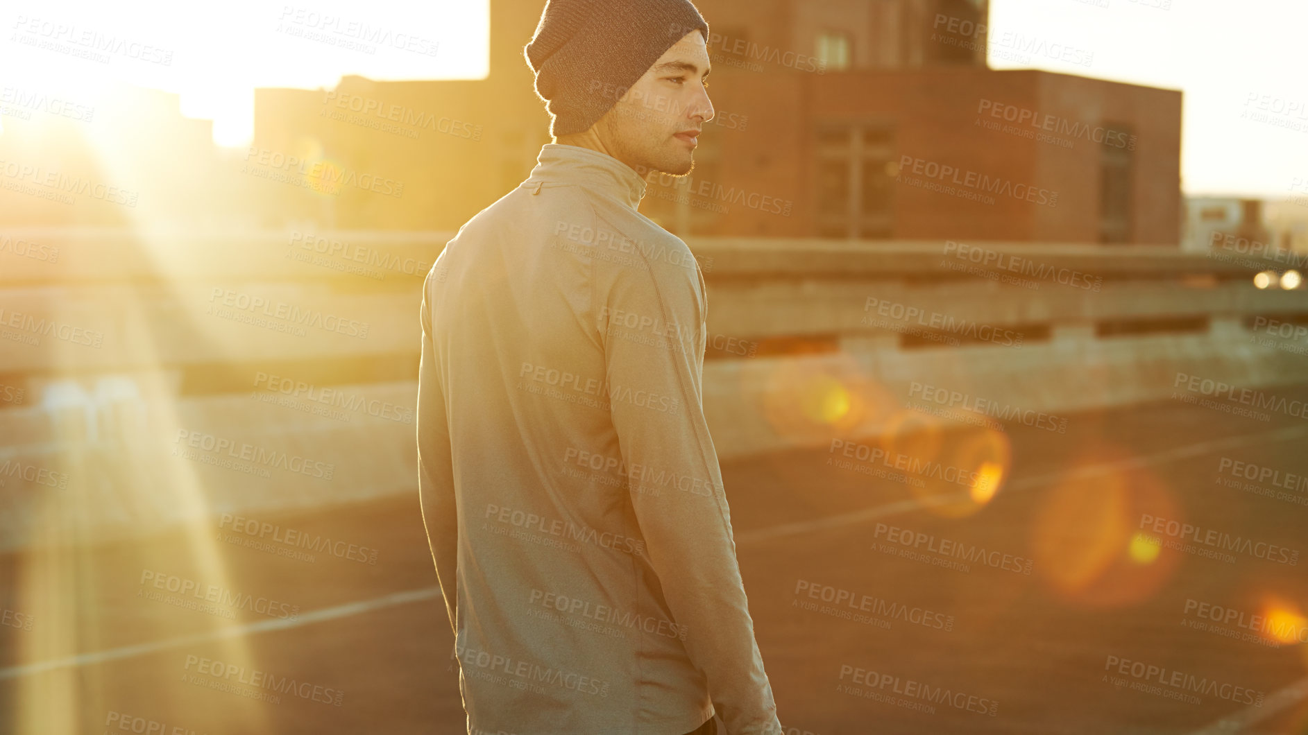 Buy stock photo Man, runner and sunrise in street, city and thinking for fitness, training and health in morning. Person, direction and exercise on metro road at dawn for workout, progress and prepare for marathon