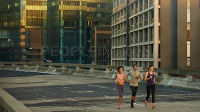 Buy stock photo Portrait, friends and running in city for workout, endurance and burn calories with exercise as team. Energy, people or cardio fitness on road for wellness, health benefits or pace for training