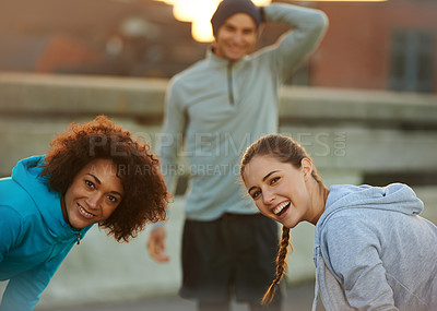 Buy stock photo Relax, fitness and portrait of women in city for exercise, marathon training and workout in urban town. Sports, happy and friends for rest, recovery and fatigue for performance, wellness and running