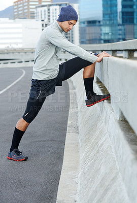 Buy stock photo Active, man and stretching on bridge for fitness with marathon training, cardio exercise and muscle growth. Athlete, male runner and warm up with workout performance, balance and sports challenge