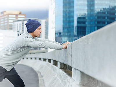 Buy stock photo Man, city and warm up for fitness on street, bridge challenge and morning for cardio workout. Male person, stretching and urban town for muscle relief, outdoor and athlete for start of training