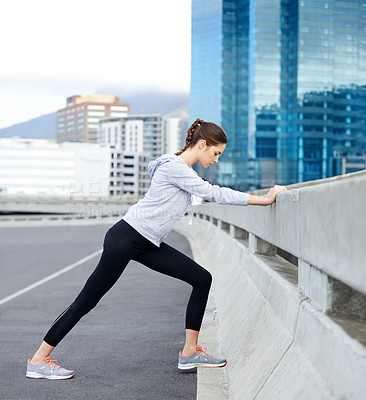 Buy stock photo Woman, city and warm up for exercise on street, bridge challenge and morning for cardio workout. Female person, stretching and urban town for muscle relief, outdoor and athlete for start of training