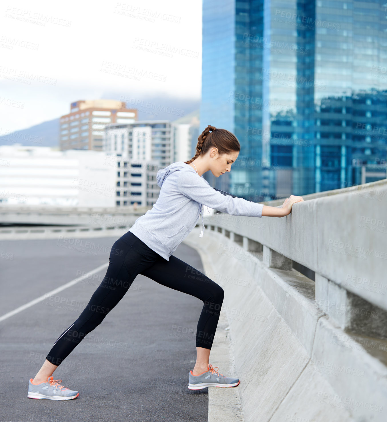 Buy stock photo Woman, city and warm up for exercise on street, bridge challenge and morning for cardio workout. Female person, stretching and urban town for muscle relief, outdoor and athlete for start of training
