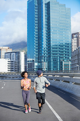 Buy stock photo City, challenge and couple with running for fitness, endurance and health benefits with training on road. Bridge, man and woman with support for cardiovascular exercise, burn calories and wellness