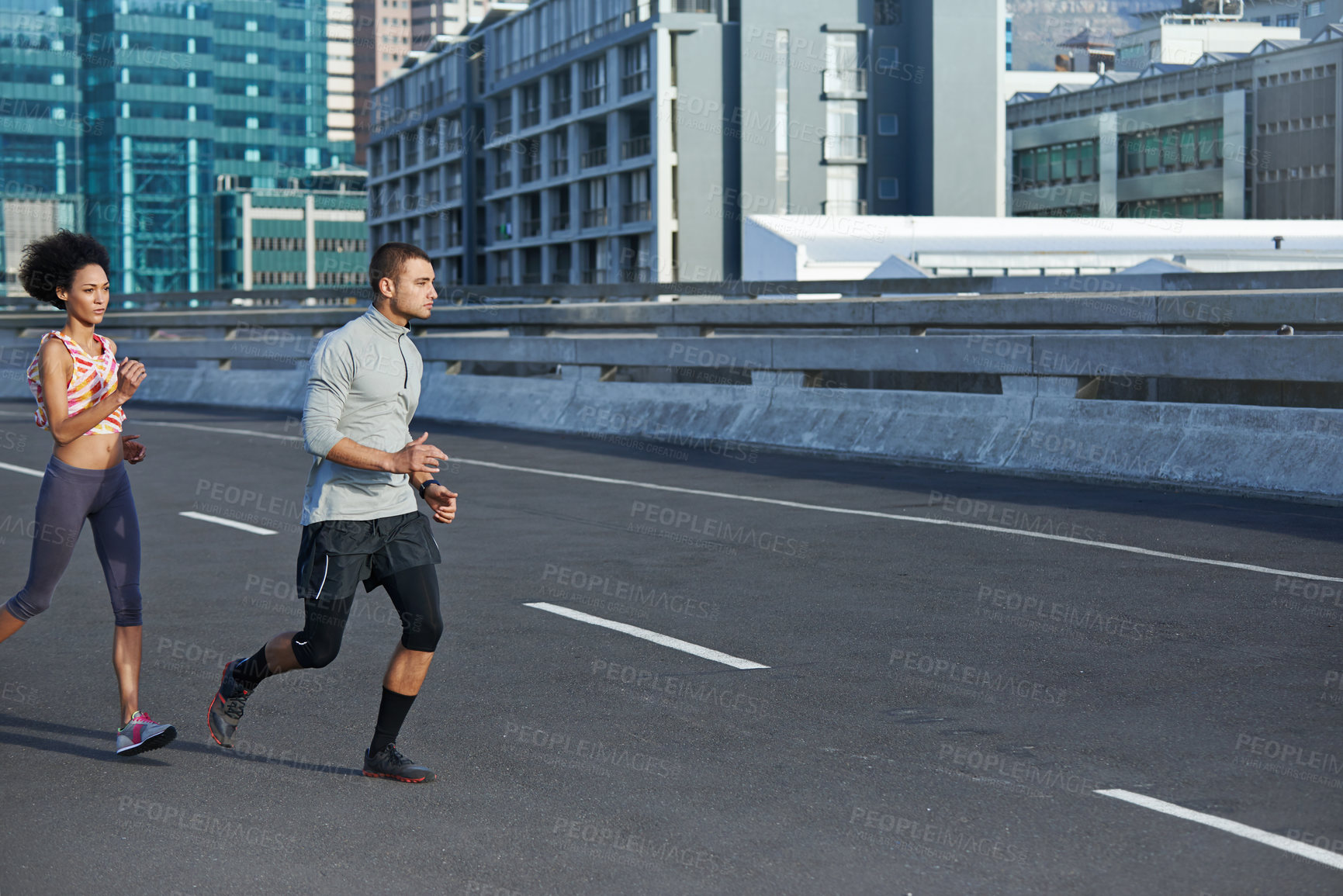 Buy stock photo Running, cardio and training with couple in city for start of fitness, athlete and wellness. Race, exercise and marathon workout with people for urban, health and sports performance together
