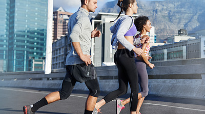 Buy stock photo Running, workout and fitness with friends in city for start of training, athlete and wellness. Race, exercise and marathon cardio with people for urban, health and sports performance together