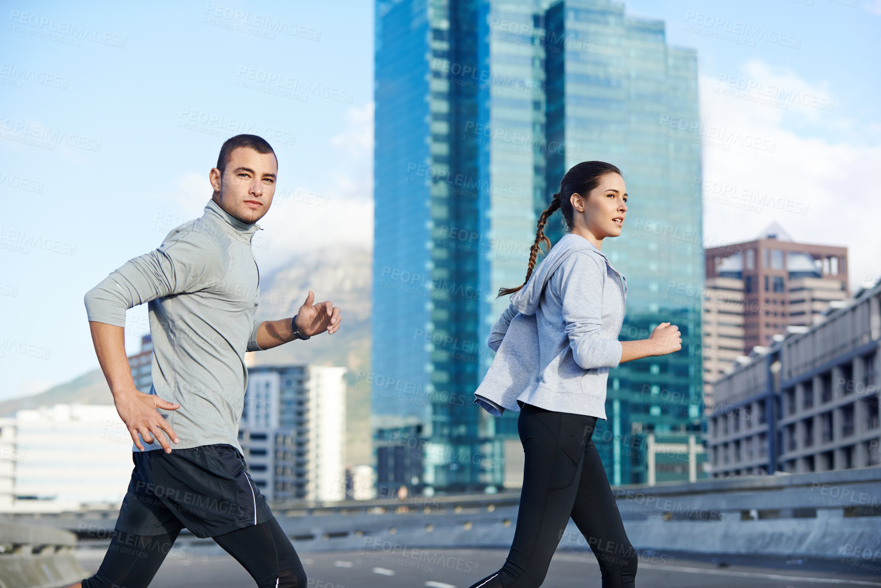 Buy stock photo Running, workout and coaching with people in city for start of training, fitness and wellness. Race, exercise and marathon cardio with runner for personal trainer, health and sports performance