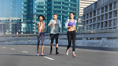 Buy stock photo Running, training and coaching with people in city for start of workout, fitness and wellness. Race, exercise and marathon cardio with runner for personal trainer, health and sports performance