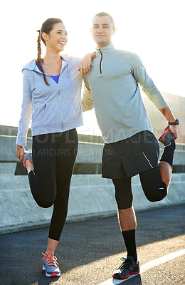 Buy stock photo Happy couple, stretching and road with fitness for workout preparation, exercise or training together in city. Man, woman and runners enjoying warm up or getting ready for running in an urban town