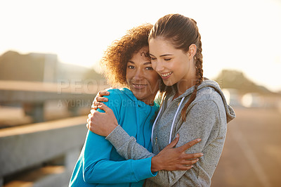Buy stock photo Women, portrait and embrace in city for fitness, exercise and running session for marathon challenge outdoor. Sunshine, people and friends with hug for wellness goals, support and bonding by road