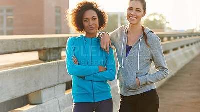 Buy stock photo Happy women, portrait and fitness with confidence in city for workout, training or outdor exercise together. Young, female person or runners with smile for cardio, health or wellness in an urban town