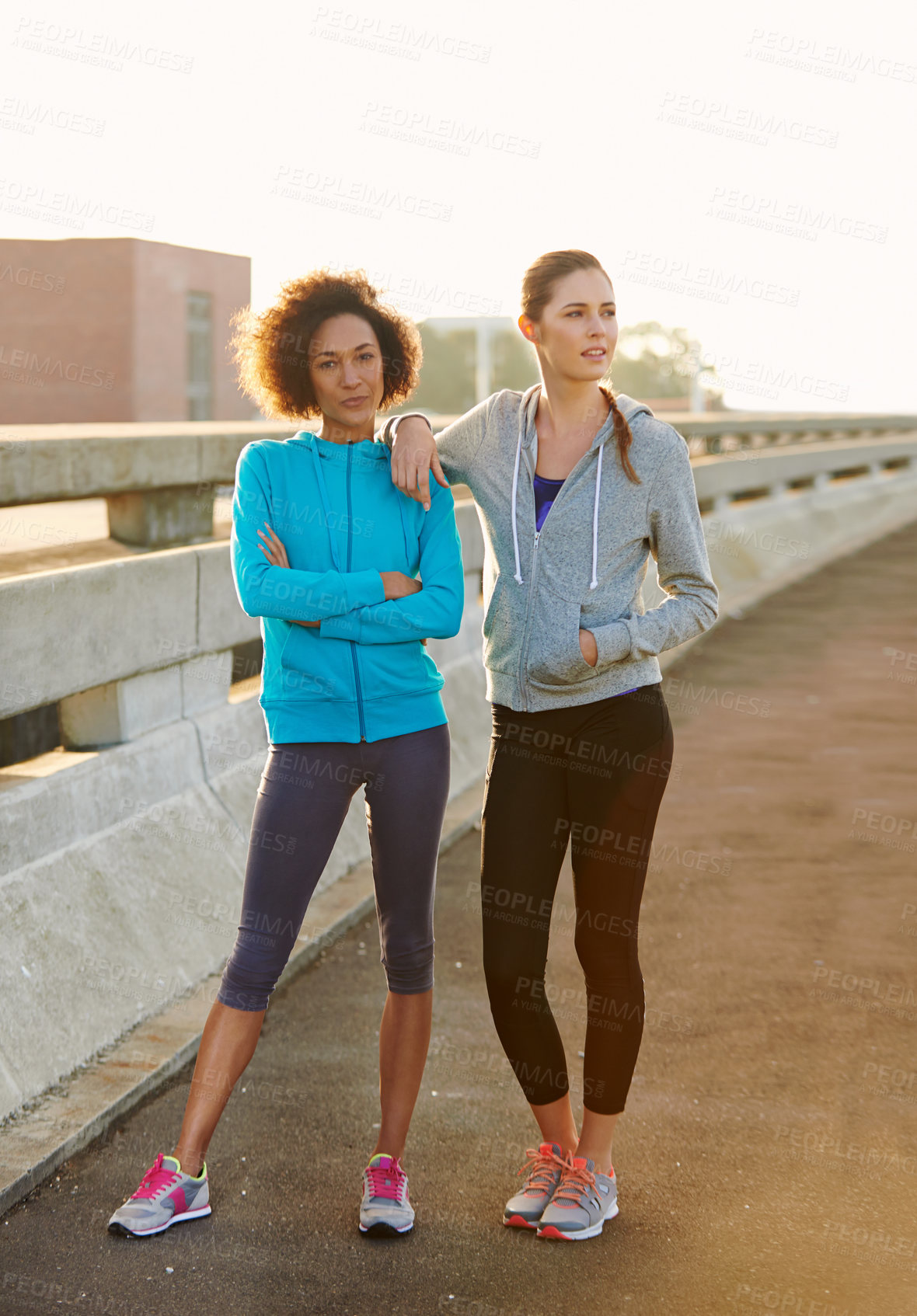 Buy stock photo Fitness, portrait and women in city for running with race, marathon or endurance training. Sports, serious and team of female athletes in town street for cardio workout, exercise or challenge.