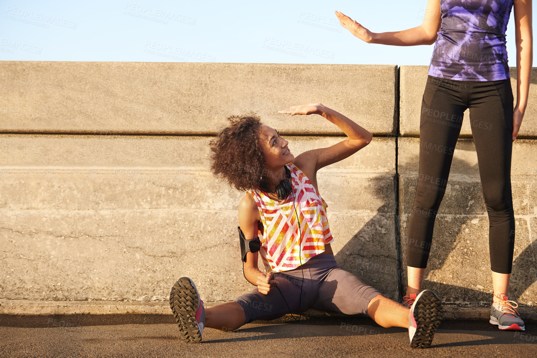 Buy stock photo Friends, high five and women in city for exercise, marathon training and workout in urban town. Sports, fitness and happy people with celebration for performance, health and wellness for running