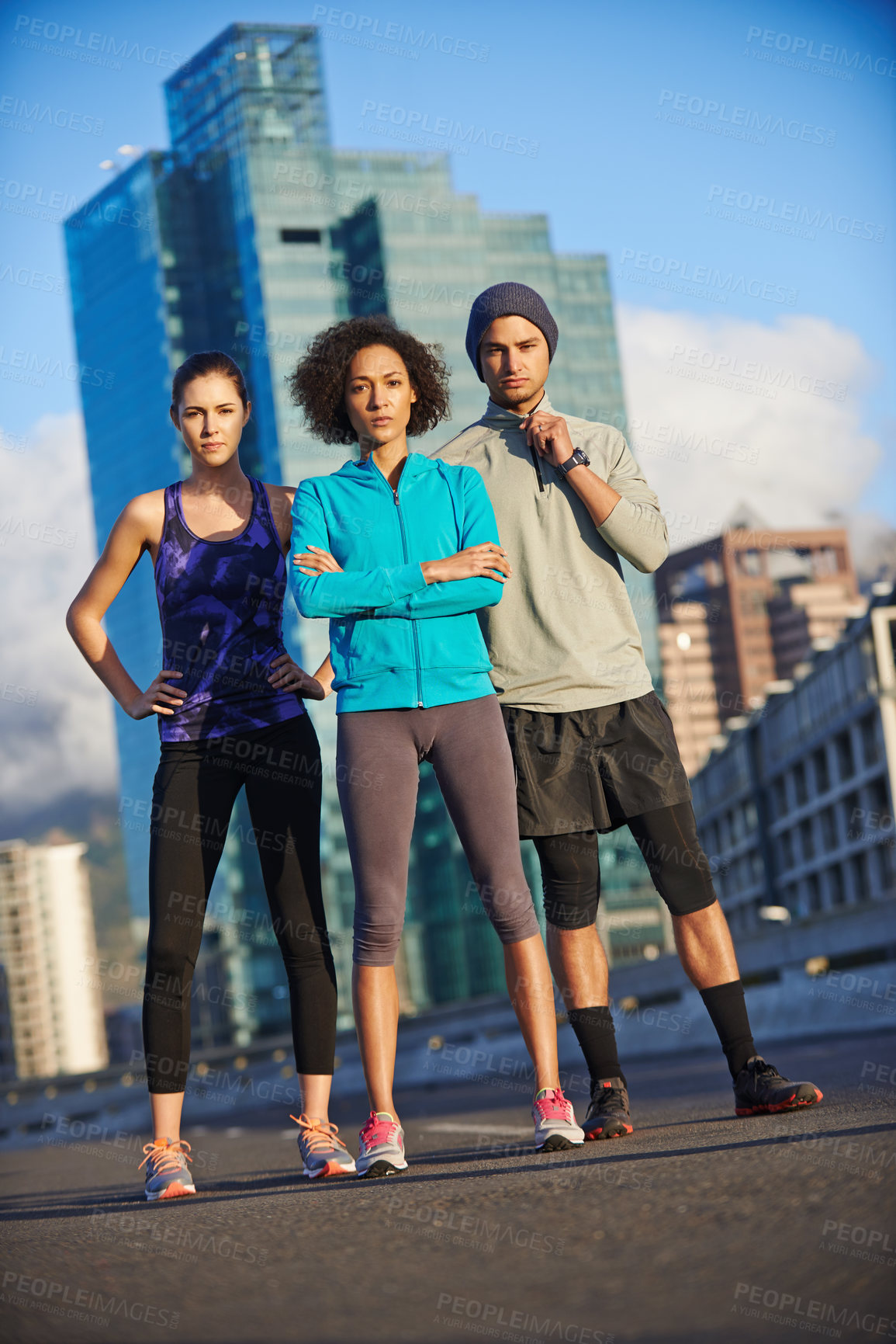 Buy stock photo Sports, portrait and group of people in city for running with race, marathon or endurance training. Fitness, serious and team of athletes in town street for cardio workout, exercise or challenge.